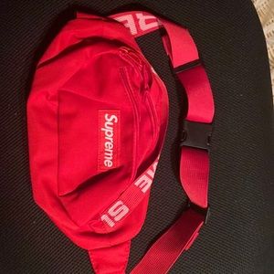 The color is red I don’t know the exact size but the stitching real